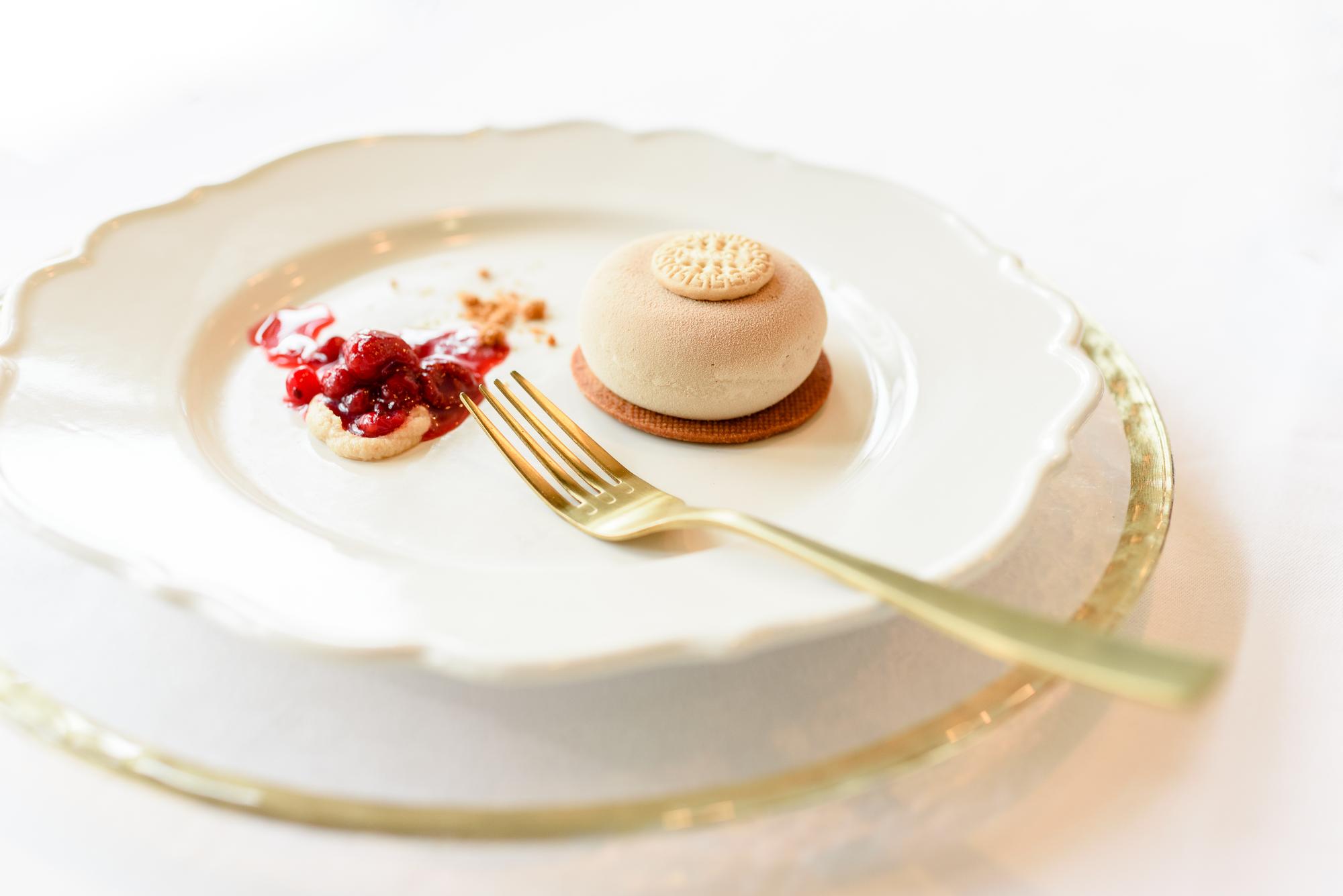 Close-up of plated gourmet dessert with gold leaf
